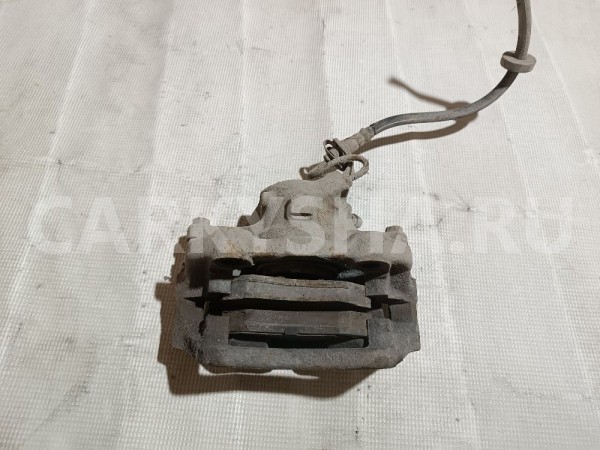 Суппорт тормозной передний правый Volkswagen Passat 