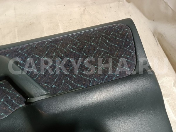 Обшивка двери передней правой Nissan Primera оригинальный номер 809002F112