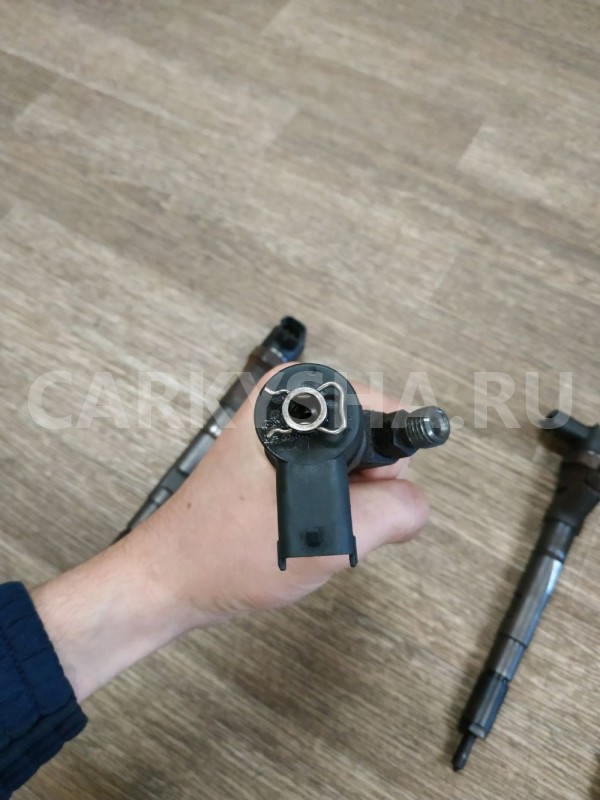 Форсунка дизельная электрическая Kia Sorento оригинальный номер 338004A500