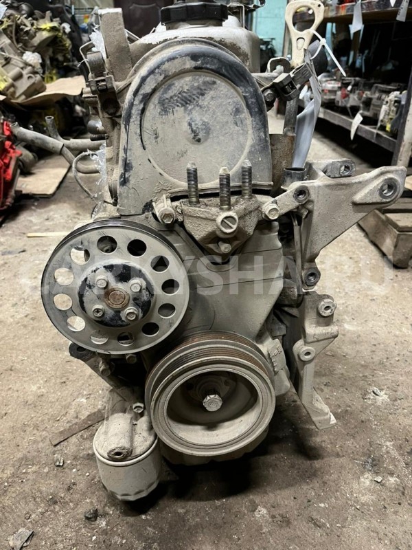 Двигатель в сборе Mitsubishi Lancer оригинальный номер MD979487