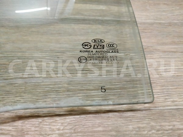 Стекло двери задней левой Kia Rio 