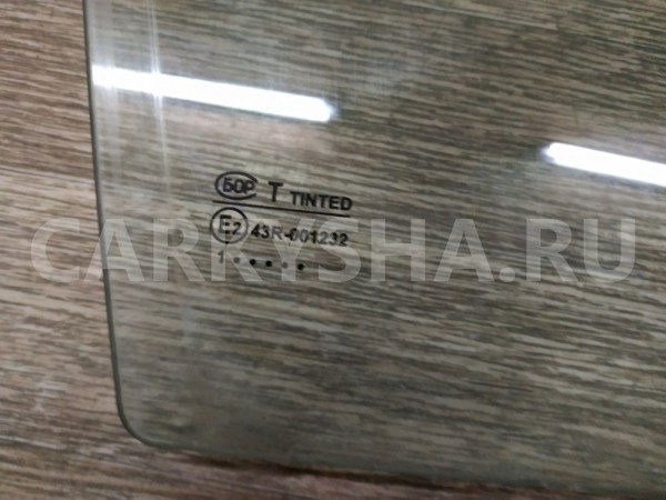 Стекло двери передней правой Kia Shuma 