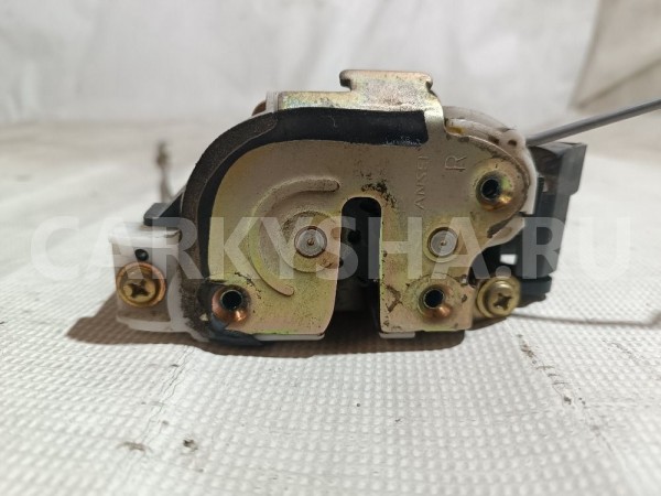 Замок двери передней правой Mitsubishi Lancer 