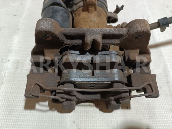 Суппорт тормозной задний левый Ford Mondeo 