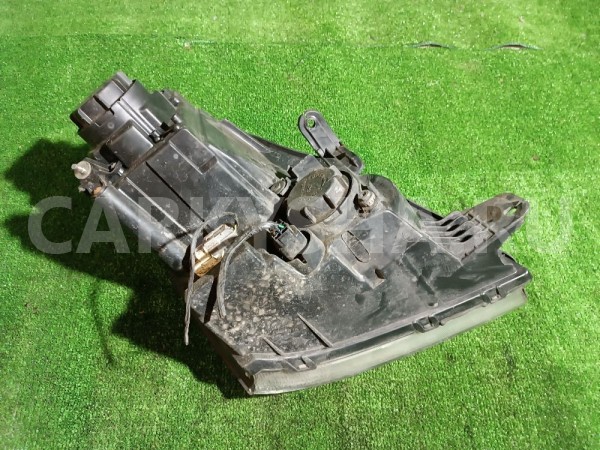 Фара левая Ssang Yong Rexton 