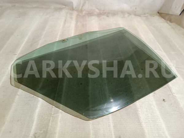 Стекло двери задней левой Volvo S40 