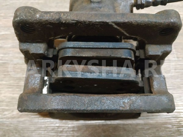 Суппорт тормозной задний левый Land Rover Freelander 