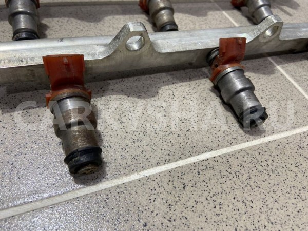 Рампа с форсунками TOYOTA CAMRY 1992 г Toyota Camry оригинальный номер 2325011070