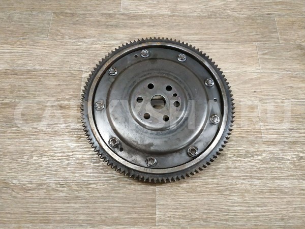 Маховик Nissan Note оригинальный номер 12310AX100