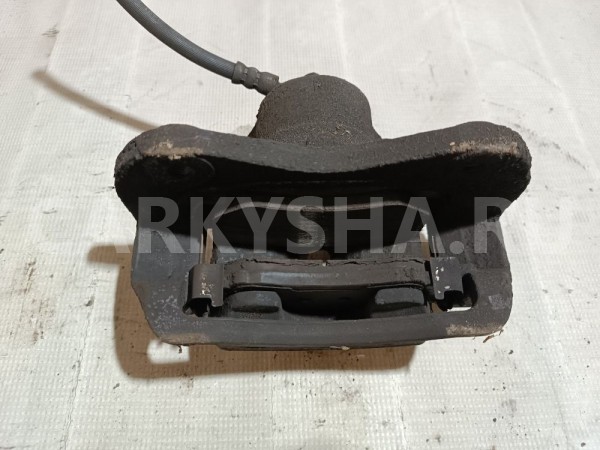 Суппорт тормозной передний левый Hyundai Coupe 
