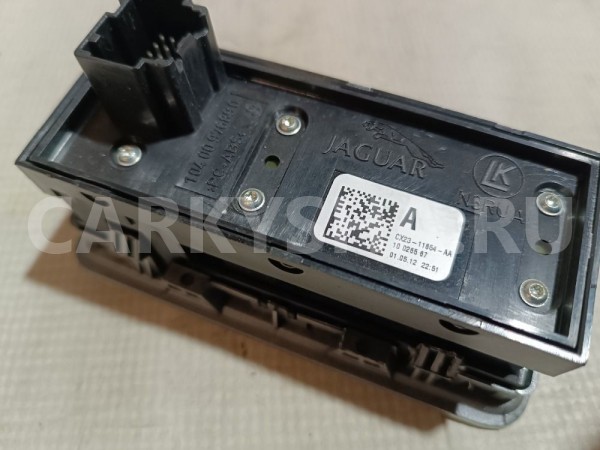 Кнопка многофункциональная Jaguar XF оригинальный номер CX2311654AA