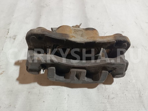 Суппорт тормозной передний левый Mitsubishi Diamante 