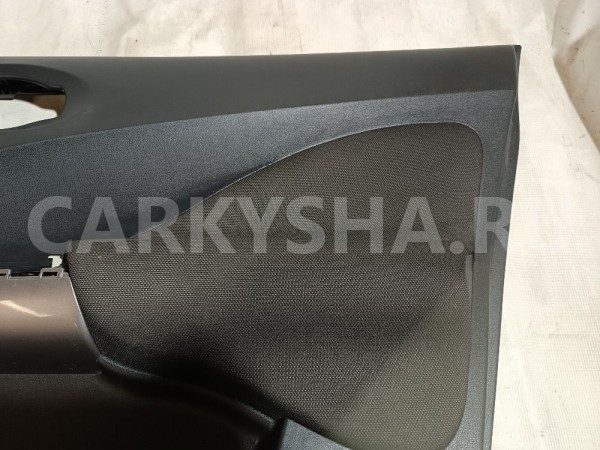 Обшивка двери передней правой Nissan Juke оригинальный номер 809001Kb0A