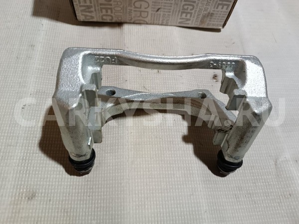 Скоба суппорта Nissan Almera 