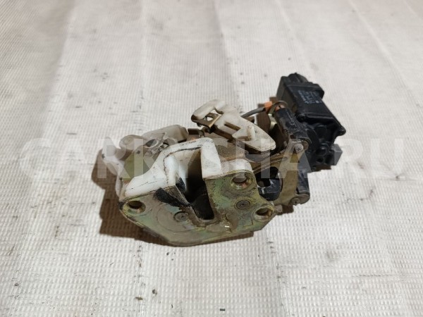 Замок двери задней левой Mitsubishi Galant оригинальный номер MB887409