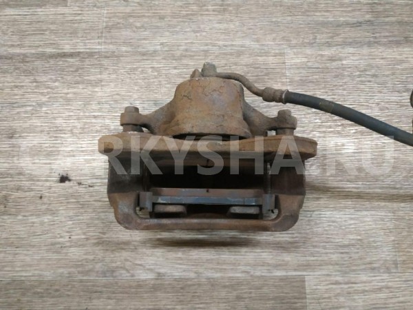 Суппорт тормозной передний правый Hyundai ix35 оригинальный номер 581302Y000