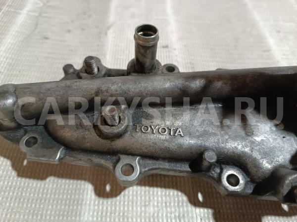 Корпус масляного фильтра Toyota Land Cruiser оригинальный номер 1570130090