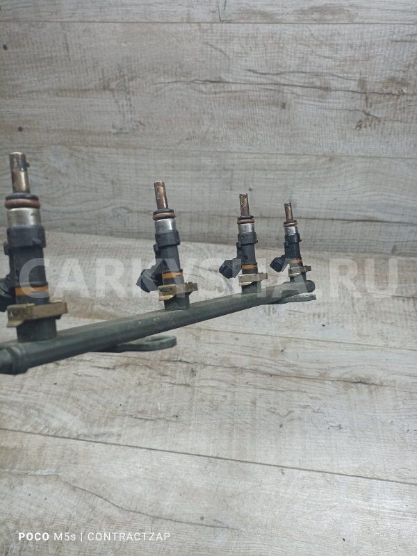 Топливная рейка Mitsubishi Outlander II (2005—2009) Mitsubishi i оригинальный номер 1465a030