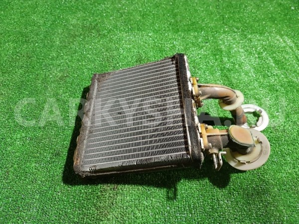 Радиатор отопителя Nissan Avenir оригинальный номер 271400M010