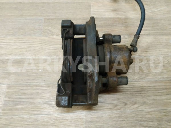 Суппорт тормозной передний левый Ford Focus 