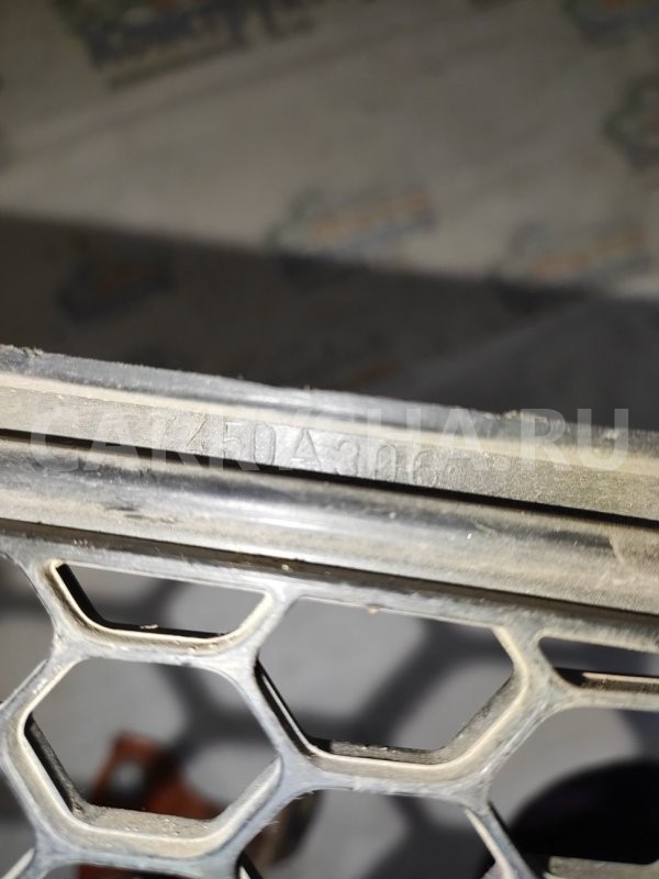 Решетка в бампер Mitsubishi Lancer 