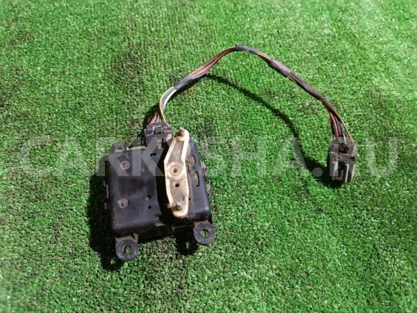 Моторчик заслонки отопителя Nissan Cefiro 