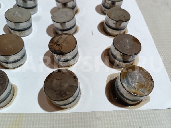 Гидрокомпенсатор Mazda 626 оригинальный номер FS1212101