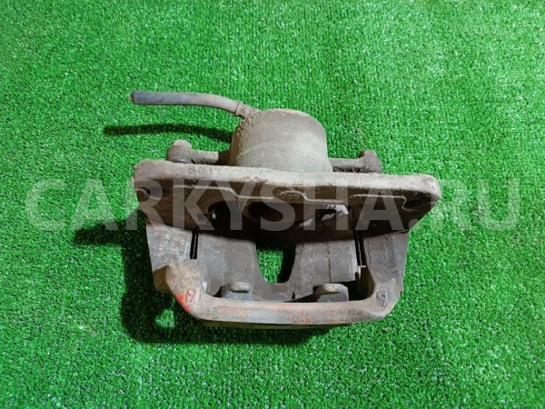 Суппорт тормозной передний левый Toyota Windom 