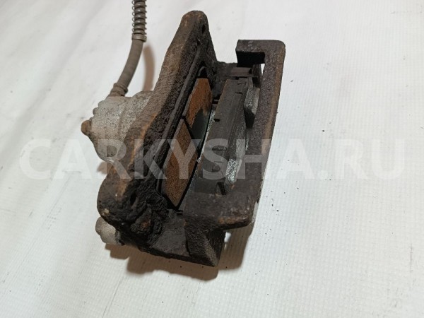 Суппорт тормозной задний правый Kia Sorento оригинальный номер 582303E000