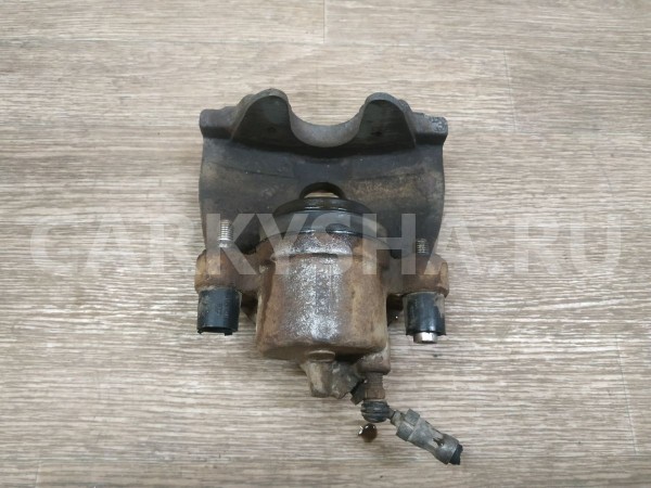 Суппорт тормозной передний левый Ford Focus 