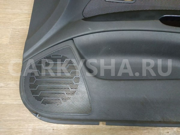 Обшивка двери передней правой Kia Rio 