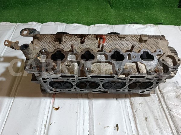 Головка блока (в сборе) Mitsubishi i оригинальный номер MD344154