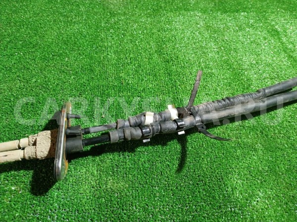 Трос КПП Mitsubishi Lancer 