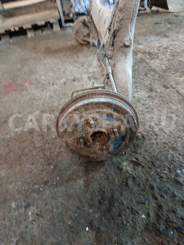 Балка задняя Geely MK Cross оригинальный номер 1014002428