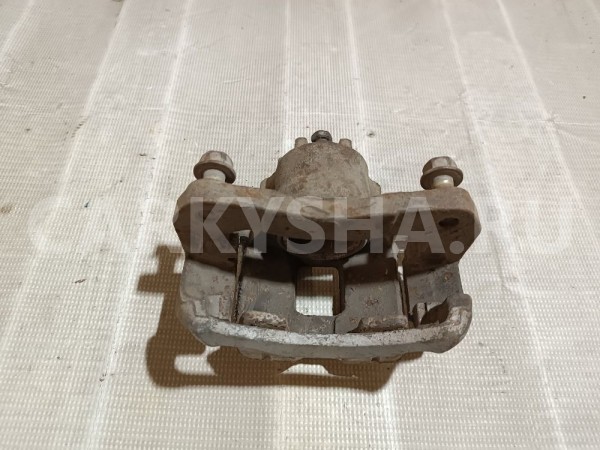 Суппорт тормозной передний левый Mitsubishi Lancer оригинальный номер MR569126