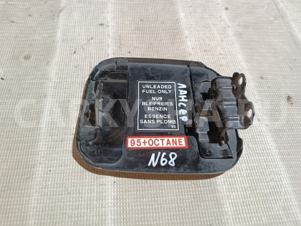 Лючок бензобака Mitsubishi Lancer 