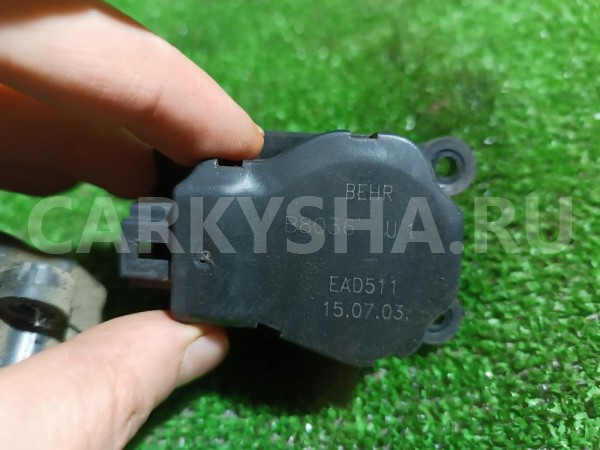 Моторчик заслонки отопителя Opel Astra 