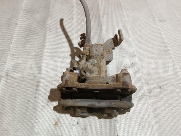 Суппорт тормозной задний левый Mazda 6 