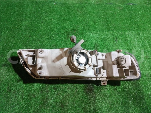 Фара левая Nissan Cefiro 