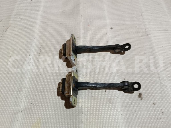 Ограничитель двери передний Hyundai Coupe оригинальный номер 793802C000