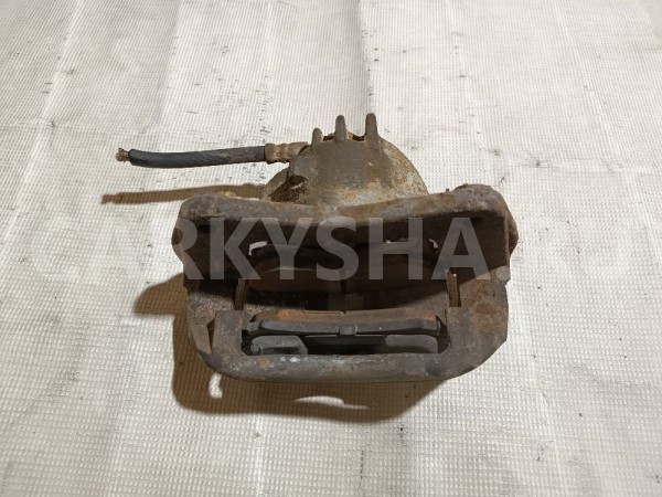 Суппорт тормозной передний левый Volvo S40 оригинальный номер M863311