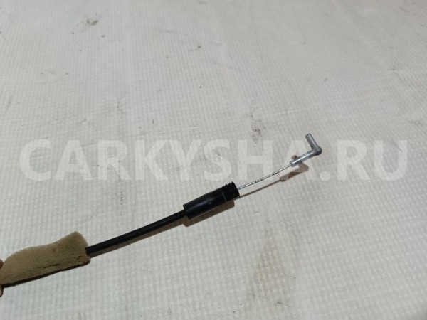 Трос замка двери Mitsubishi Lancer 