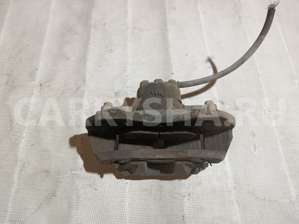 Суппорт тормозной передний правый Mitsubishi Lancer оригинальный номер MR955064