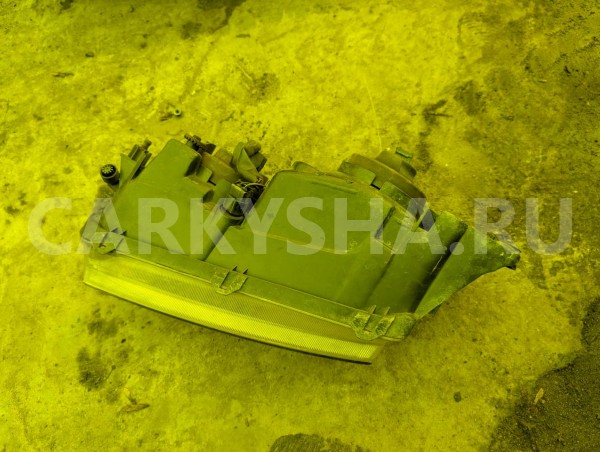 Фара Mazda Capella 