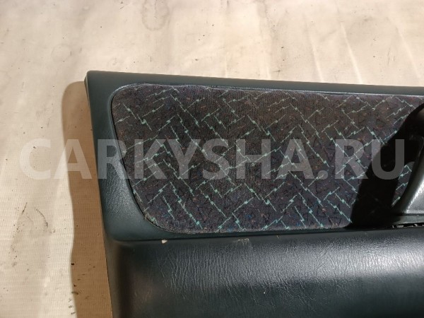 Обшивка двери передней левой Nissan Primera оригинальный номер 809012F001