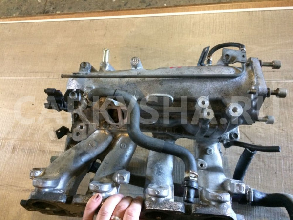 Коллектор впускной Nissan Primera P11 (1995—2000) Nissan Primera оригинальный номер 140016F000